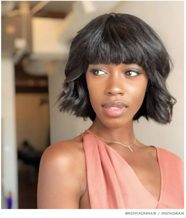 Textured Bob With Full Fringe Sew-In model